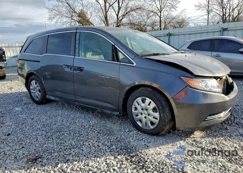 2014 Honda Odyssey Lx z USA, uszkodzony, nr VIN 5FNRL5H2XEB026826